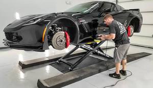 Detailing Black Corvette BendPak Mid Rise Lift