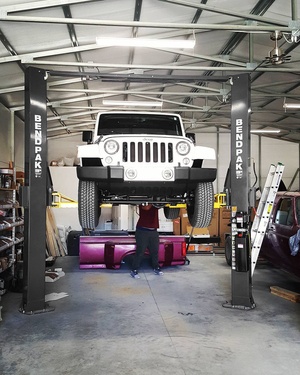 Lifting Jeep BendPak 2 Post Car Lift