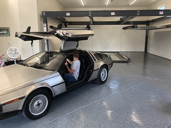 Delorean parked on BendPak parking lift